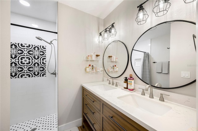 bathroom featuring walk in shower and vanity