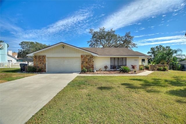 single story home with a garage and a front yard