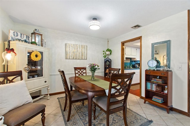 view of tiled dining space