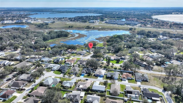 bird's eye view with a water view