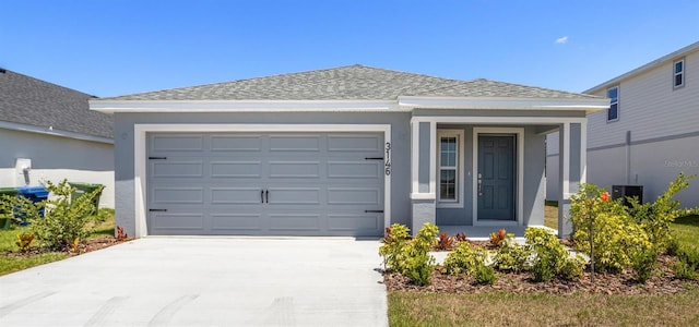 3146 Laurel Oak Ln, Winter Haven, FL 33884 - ranch-style house with driveway, a garage, a shingled roof, and stucco siding