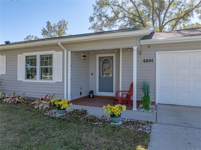 property entrance with a garage