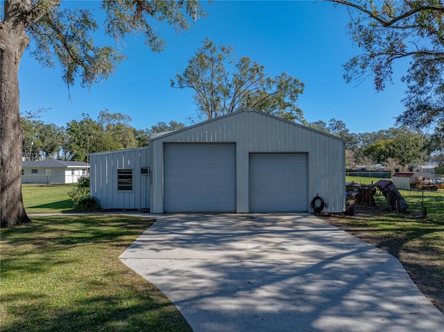 garage featuring a yard