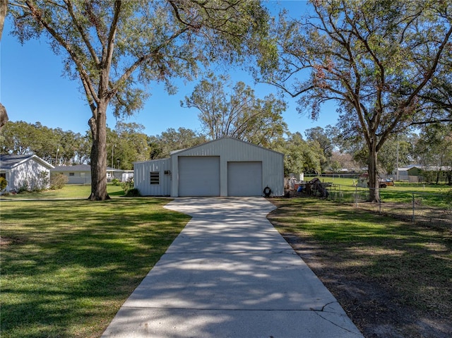 garage featuring a yard