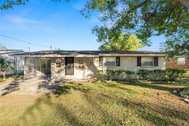 single story home with a carport and a front yard