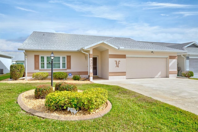 single story home with central AC, a front yard, and a garage