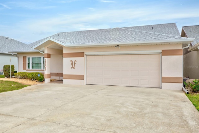 ranch-style home featuring a garage