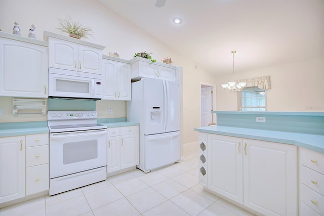 kitchen featuring white cabinetry, a notable chandelier, lofted ceiling, decorative light fixtures, and white appliances