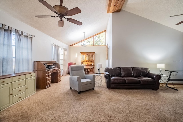 carpeted living room with vaulted ceiling with beams, ceiling fan, and a textured ceiling