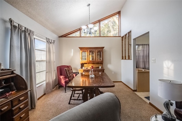 carpeted dining space with vaulted ceiling, a textured ceiling, and an inviting chandelier