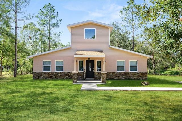 view of front facade with a front yard