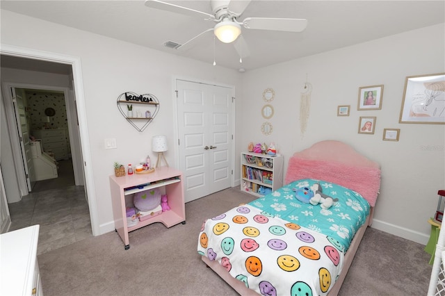 bedroom featuring light colored carpet and ceiling fan