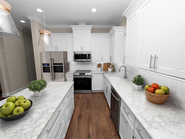 kitchen with sink, stainless steel appliances, and white cabinetry