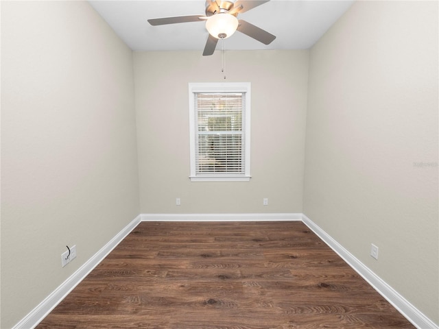 unfurnished room featuring ceiling fan and dark hardwood / wood-style floors