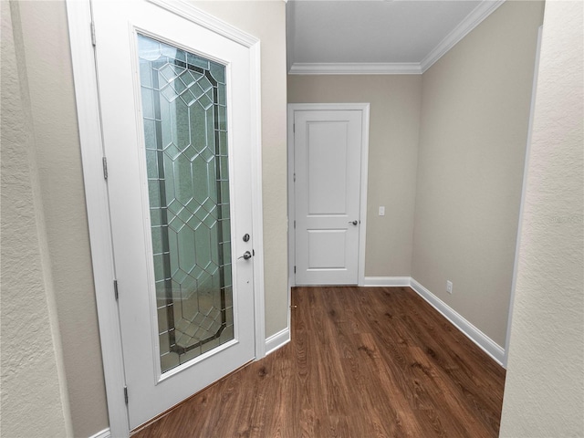 doorway to outside featuring ornamental molding and dark hardwood / wood-style flooring