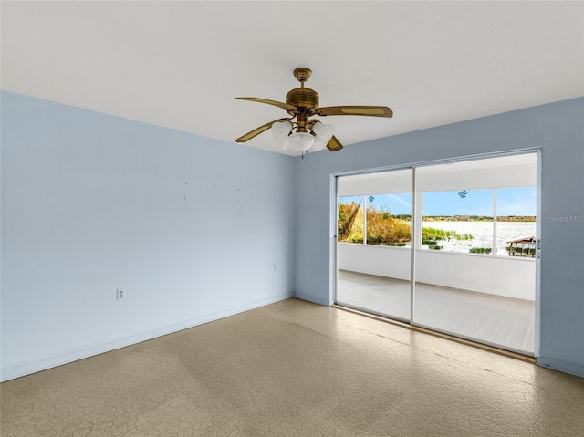 spare room featuring ceiling fan