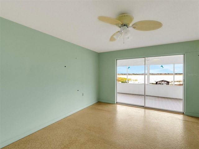 unfurnished room with ceiling fan