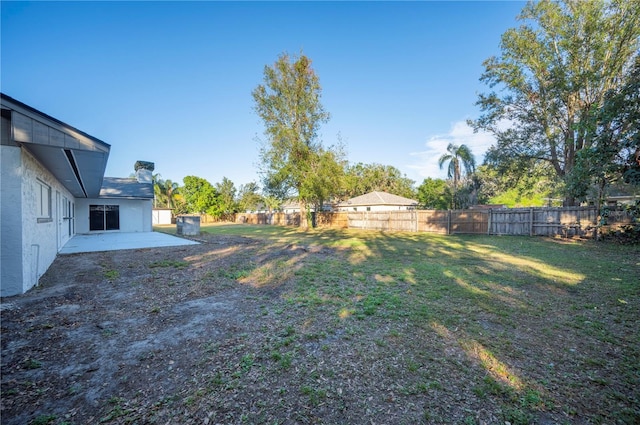 view of yard with a patio area