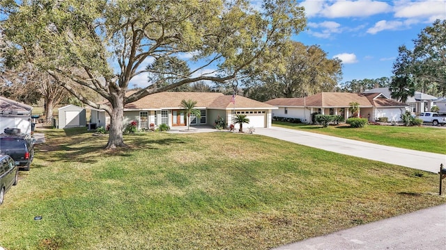 ranch-style house with a front yard and a garage