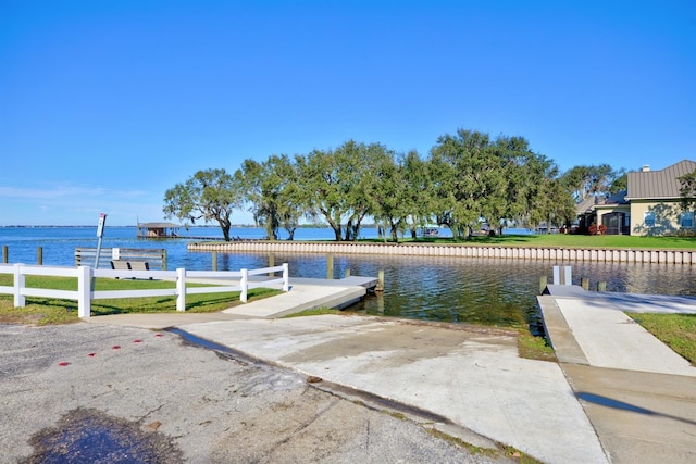 dock area featuring a water view