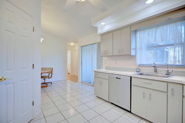 kitchen with ceiling fan, stainless steel dishwasher, sink, and light tile patterned floors