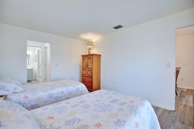 bedroom featuring light hardwood / wood-style flooring