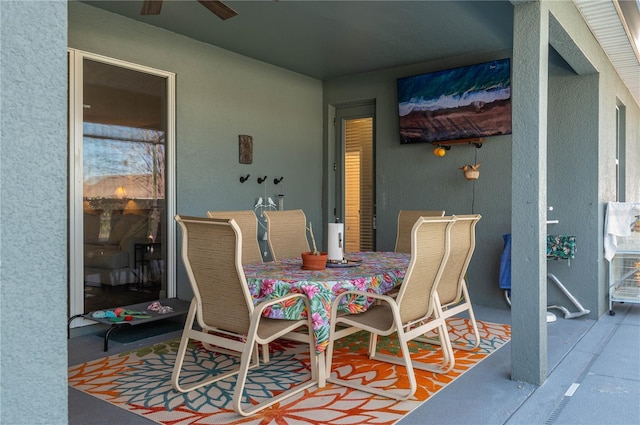 dining space with ceiling fan