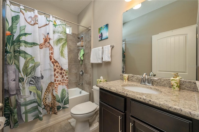 full bathroom with shower / tub combo with curtain, tile patterned flooring, vanity, toilet, and a textured ceiling