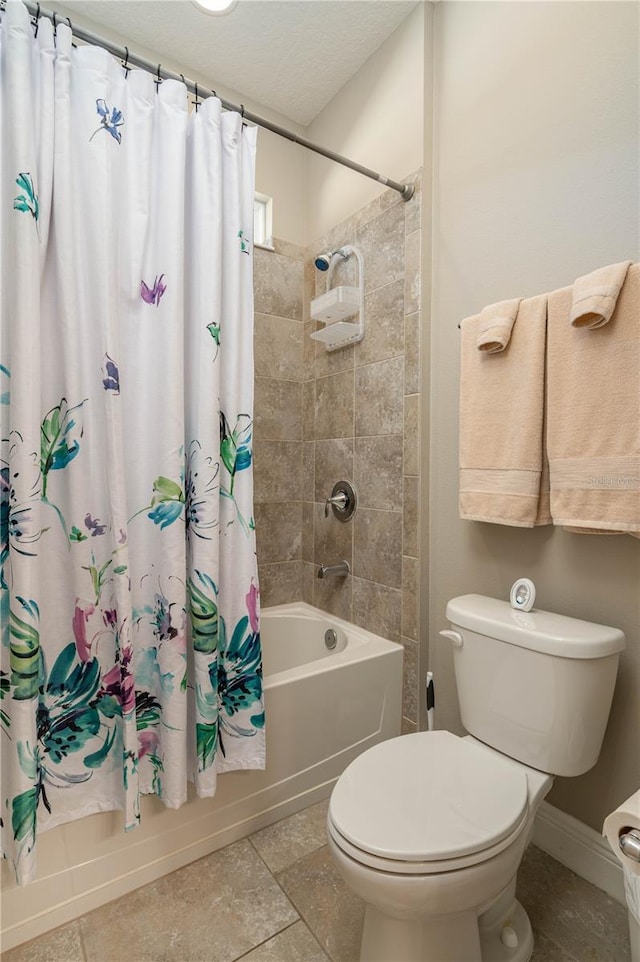 bathroom with toilet and shower / bath combo