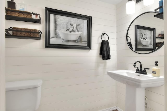 bathroom with sink and toilet