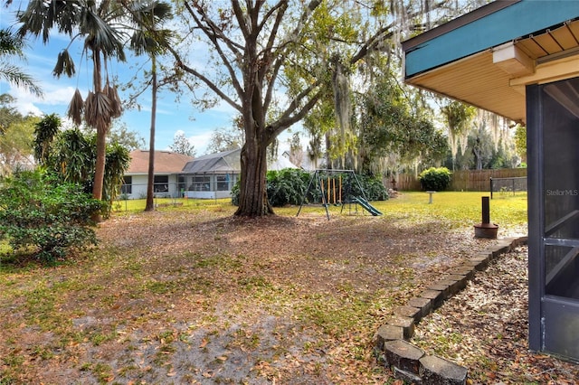 view of yard with a playground