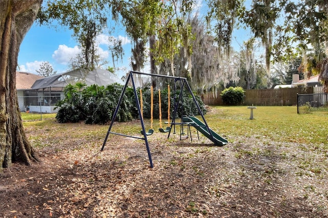 view of jungle gym featuring a yard