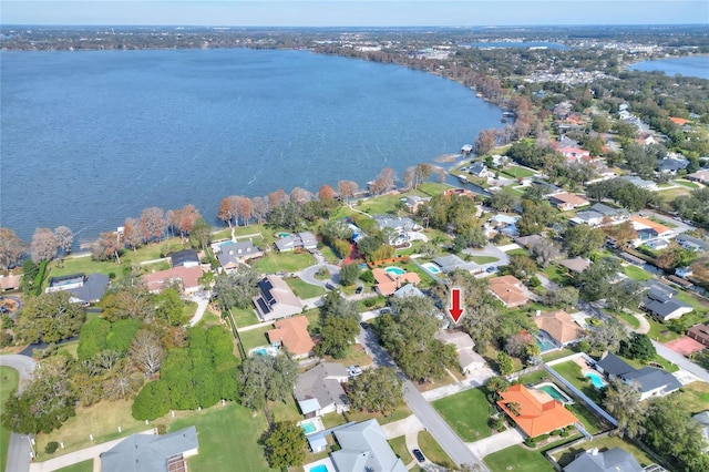 drone / aerial view with a water view