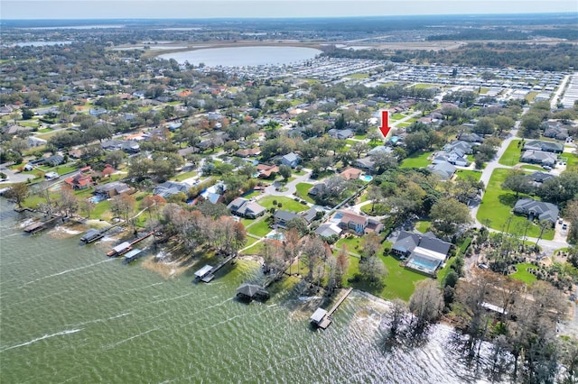 birds eye view of property featuring a water view