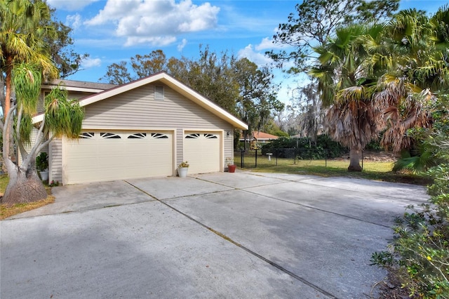 view of side of property featuring a garage