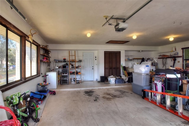 garage featuring a garage door opener