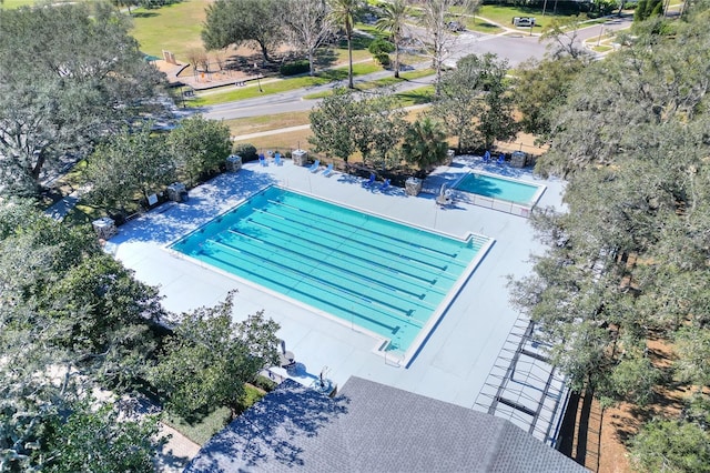 view of swimming pool featuring a patio area