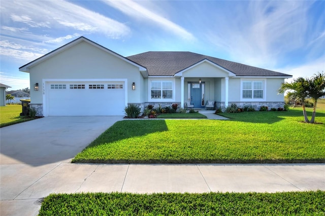 ranch-style home featuring a front yard and a garage