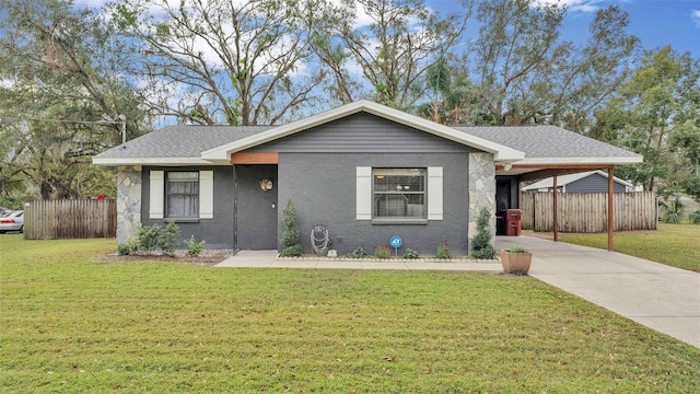 single story home with a front yard