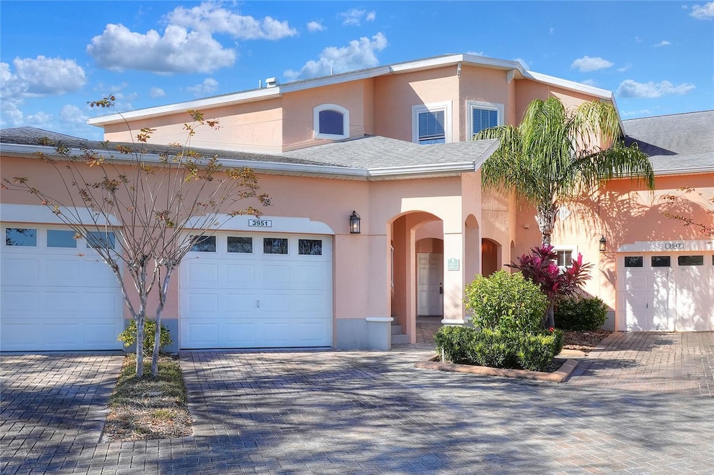 view of front of property with a garage