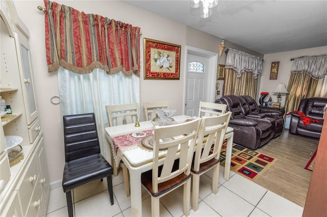 dining room with light tile patterned flooring