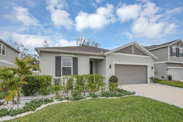 view of front facade featuring a front lawn and a garage