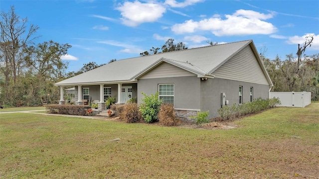 view of front of home with a front yard