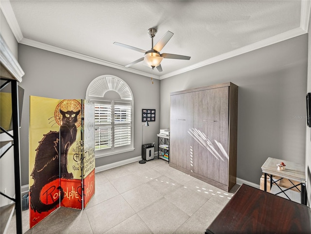 interior space with ornamental molding, a textured ceiling, and ceiling fan