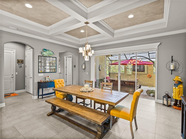 dining space featuring a notable chandelier, beam ceiling, ornamental molding, and coffered ceiling