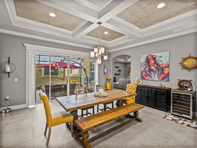 dining space with coffered ceiling, beverage cooler, ornamental molding, and beamed ceiling