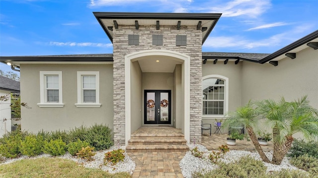 doorway to property featuring french doors