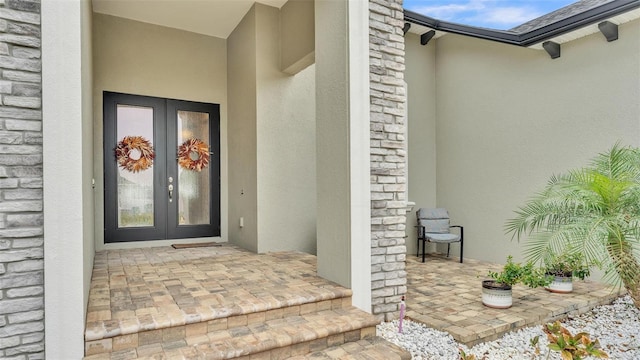 doorway to property featuring french doors