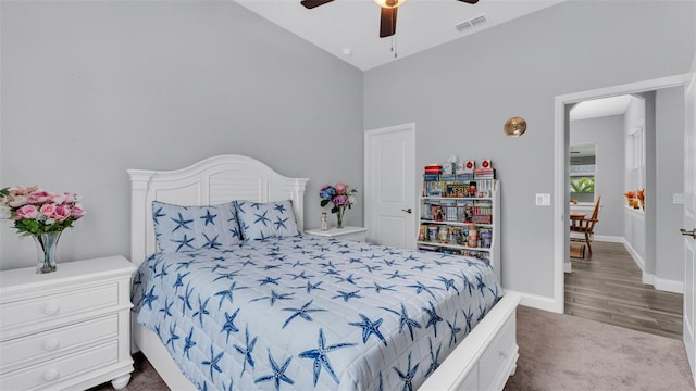 carpeted bedroom with ceiling fan