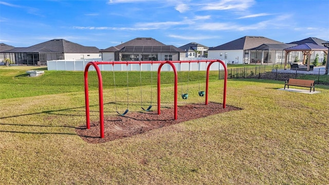 view of play area with a lawn and a gazebo